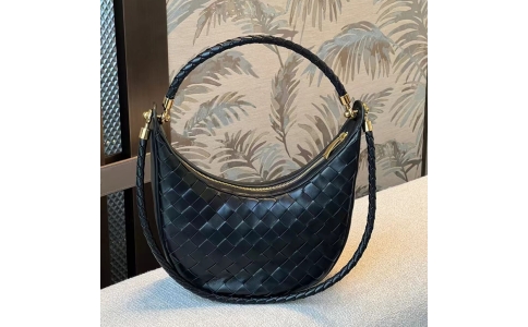 Woven crescent - shaped bag